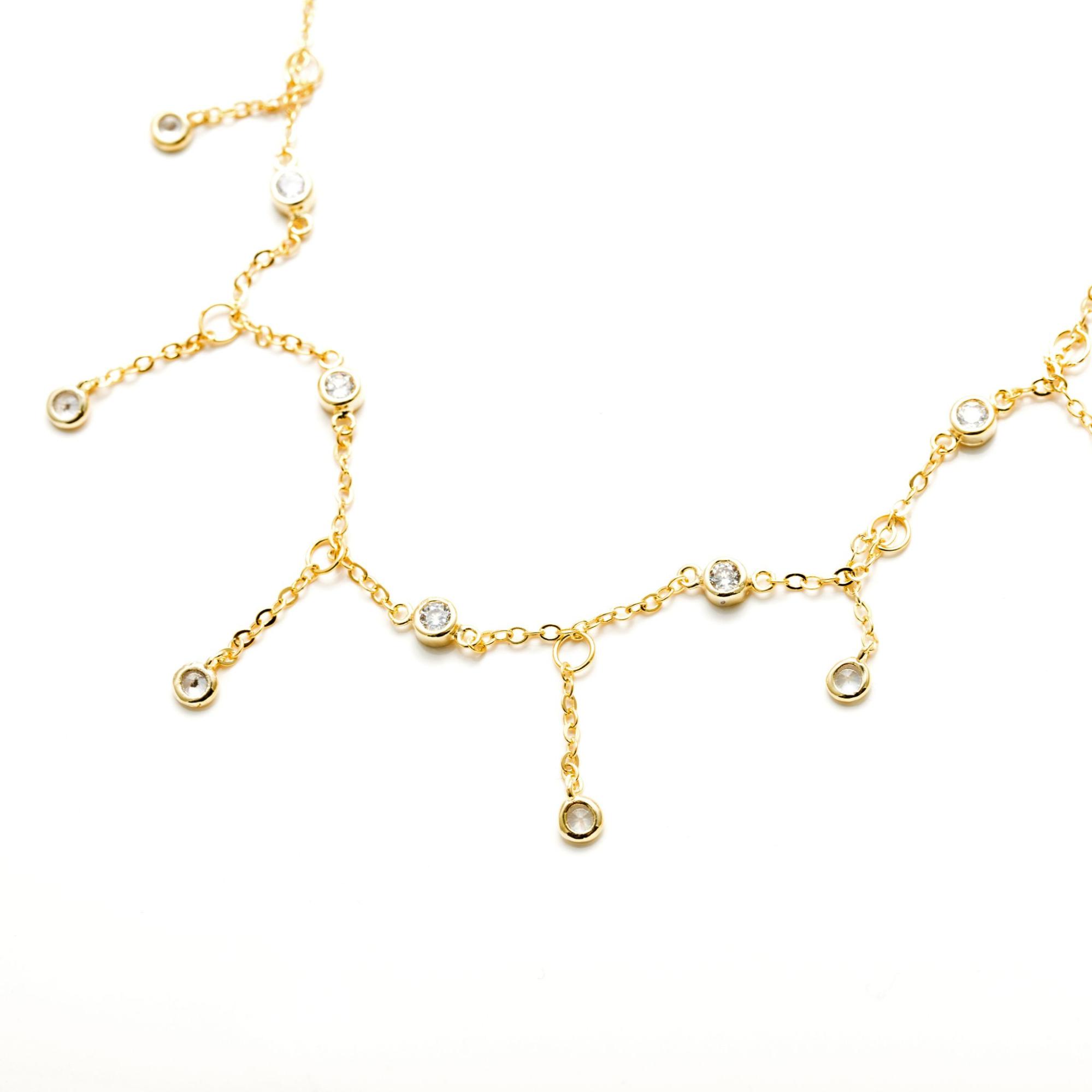 A yellow gold diamond station necklace
