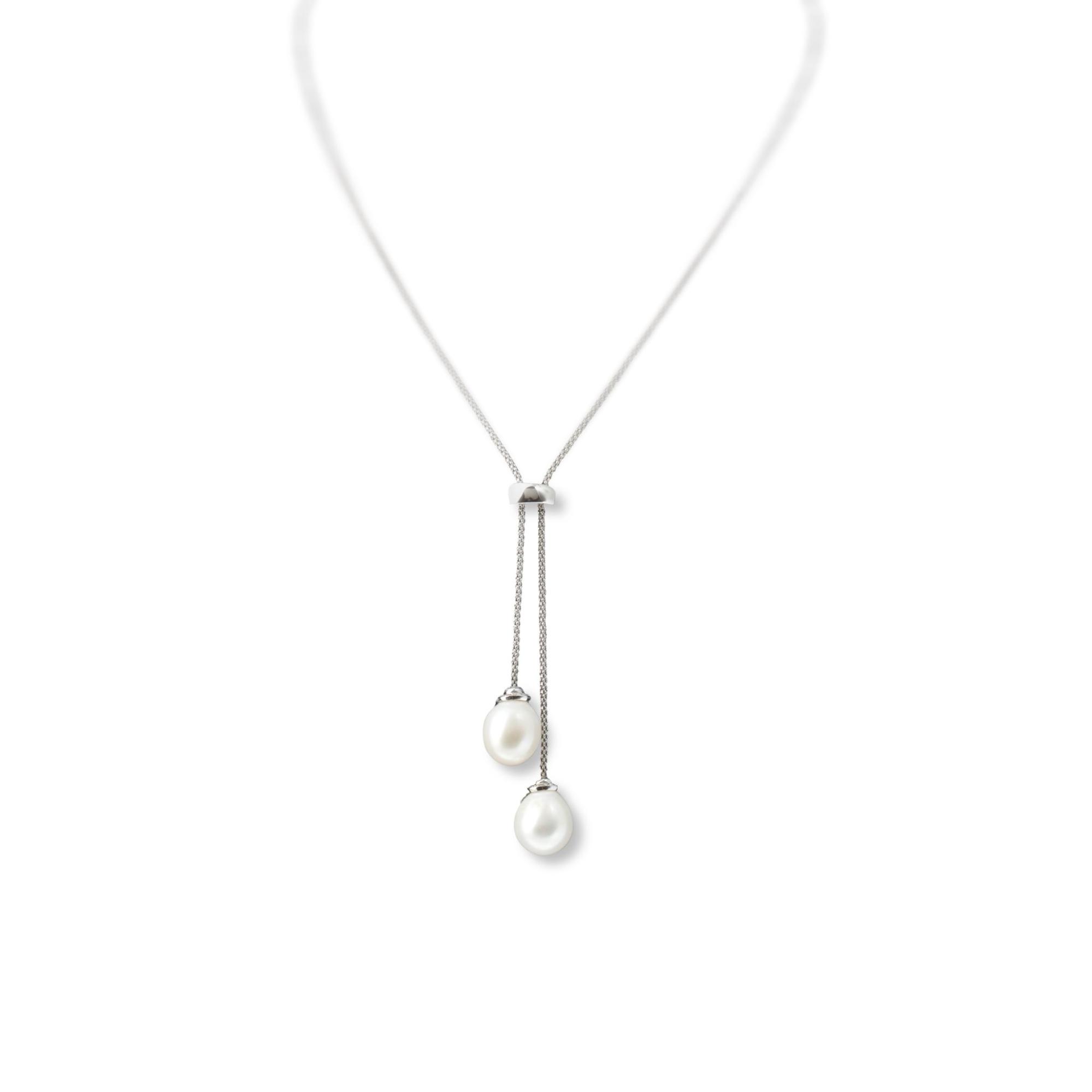A white gold Y necklace with drop down pearls