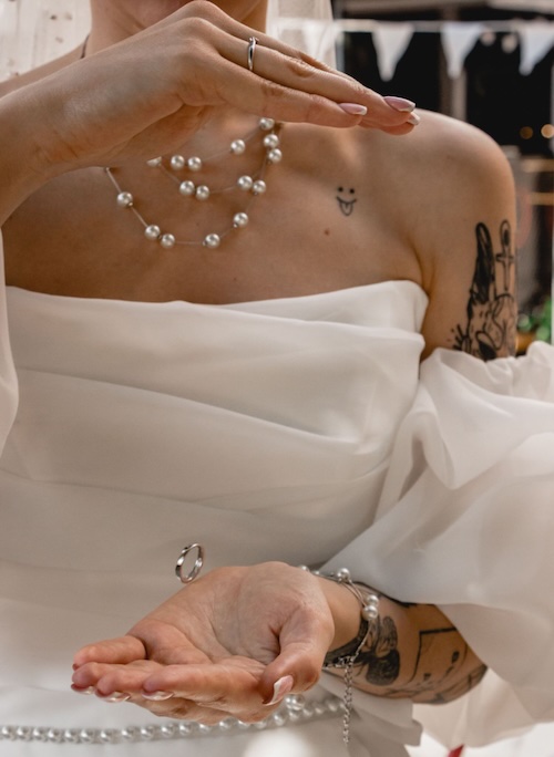 pearls around womans neck