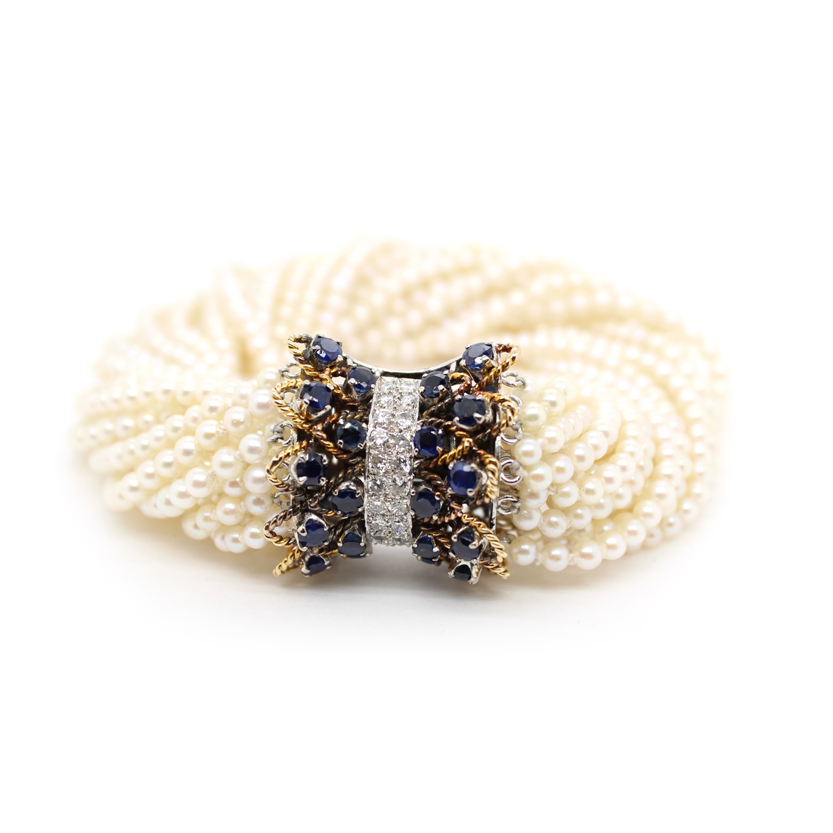 Van Cleef & Arpels Multi Strand Cultured Pearl Torsade Bracelet With A Platinum & 14 Karat White And Yellow Gold Diamond Clasp