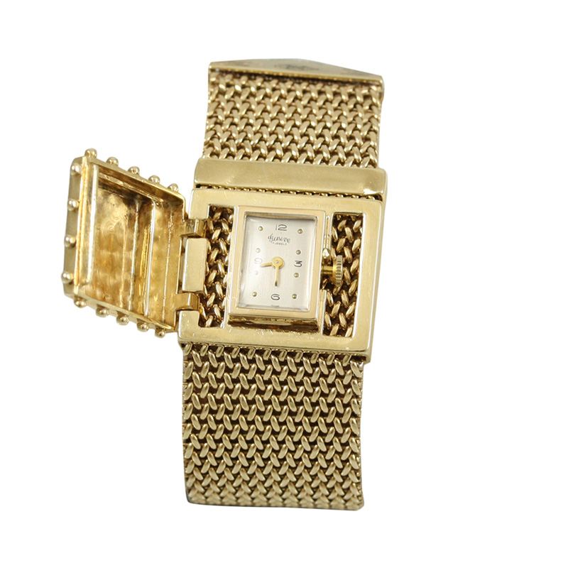 Elegant Estate 14 Karat Yellow Gold Geneve Watch Featuring An Adjustable Mesh Bracelet.