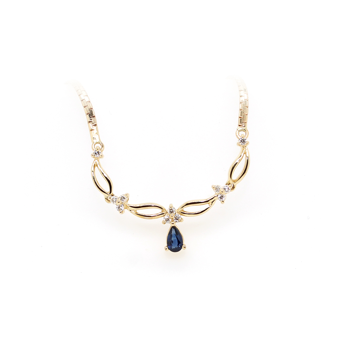 Estate 14 karat yellow gold Blue sapphire and diamond necklace having a flat fox tail chain  measuring 16.5" The necklace has a center section containing a pear shaped sapphire prong set  having three stations each having three full cut prong set diamonds